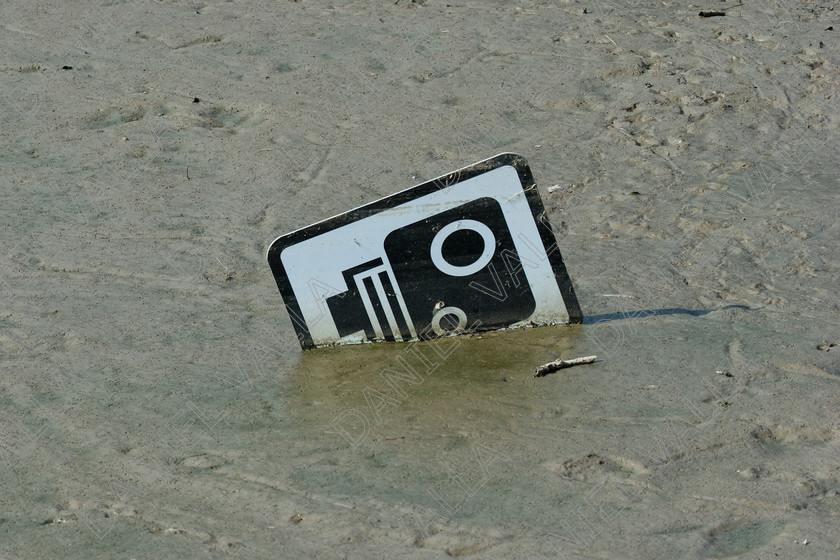 43614 Camera 
 Speed Camera sign in mud 
 Keywords: speed camera road sign mud driving offence