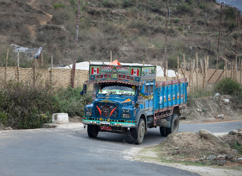 92219 Bhutan 
 Bright decorated TATA Heavy Goods colourful Lorry, Bhutan 
 Keywords: lorry heavy tata goods truck transport Bhutan