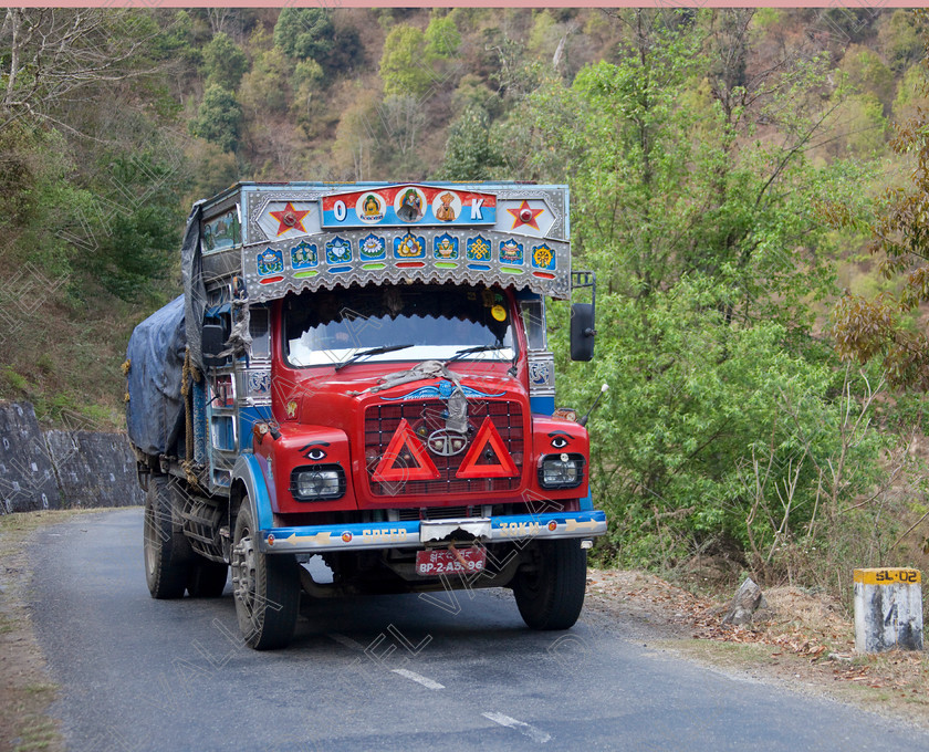 92193 Bhutan 
 Bright decorated TATA Heavy Goods colourful Lorry, Bhutan 
 Keywords: lorry heavy tata goods truck transport Bhutan