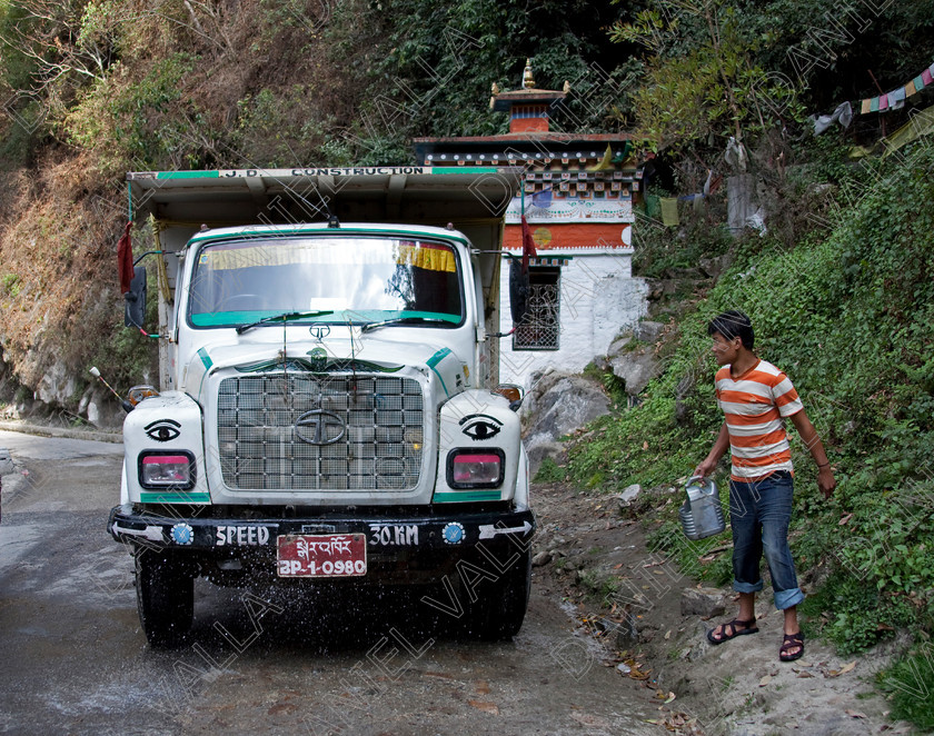 91562 Bhutan 
 Bright decorated TATA Heavy Goods colourful Lorry, Bhutan 
 Keywords: lorry heavy tata goods truck transport Bhutan