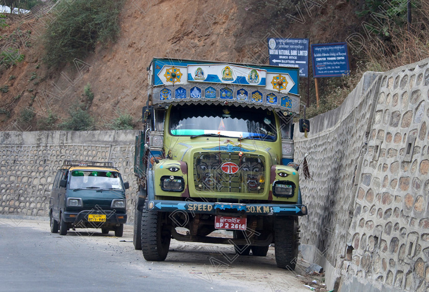 92215 Bhutan 
 Bright decorated TATA Heavy Goods colourful Lorry, Bhutan 
 Keywords: lorry heavy tata goods truck transport Bhutan