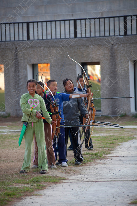 90775 Bhutan-Thimphu-Stadium 
 Archers practising archery, 
 Keywords: bow arrow national sports target competition Bhutan