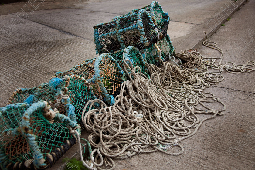 96973 Lobster pots 
 Green Lobster pots 
 Keywords: green lobter pots seafood fishing net ropes Holy Island sea ocean