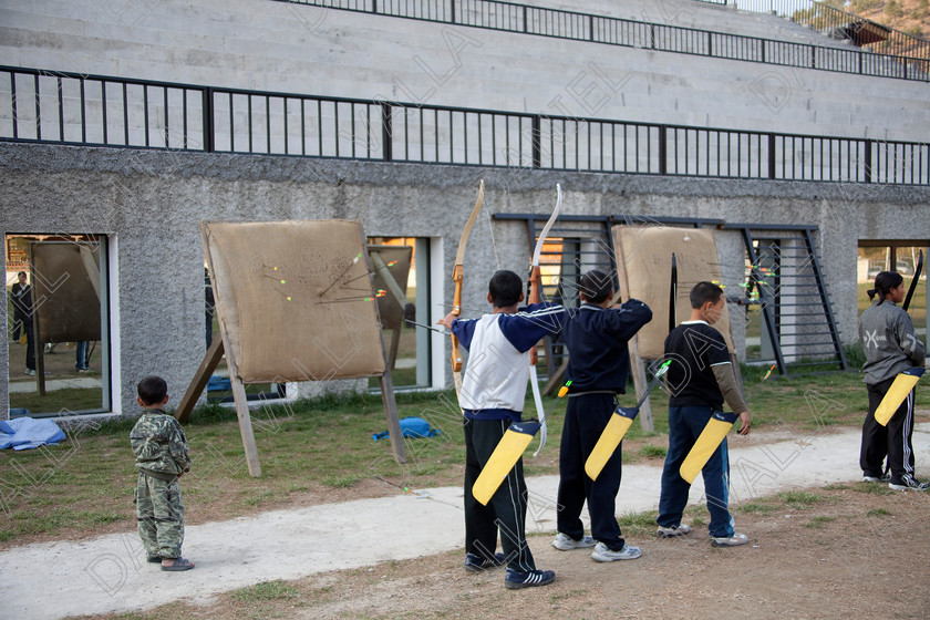 90777 Bhutan-Thimphu-Stadium 
 Archers practising archery, 
 Keywords: bow arrow national sports target competition Bhutan