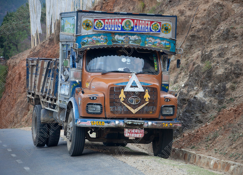 92203 Bhutan 
 Bright decorated TATA Heavy Goods colourful Lorry, Bhutan 
 Keywords: lorry heavy tata goods truck transport Bhutan